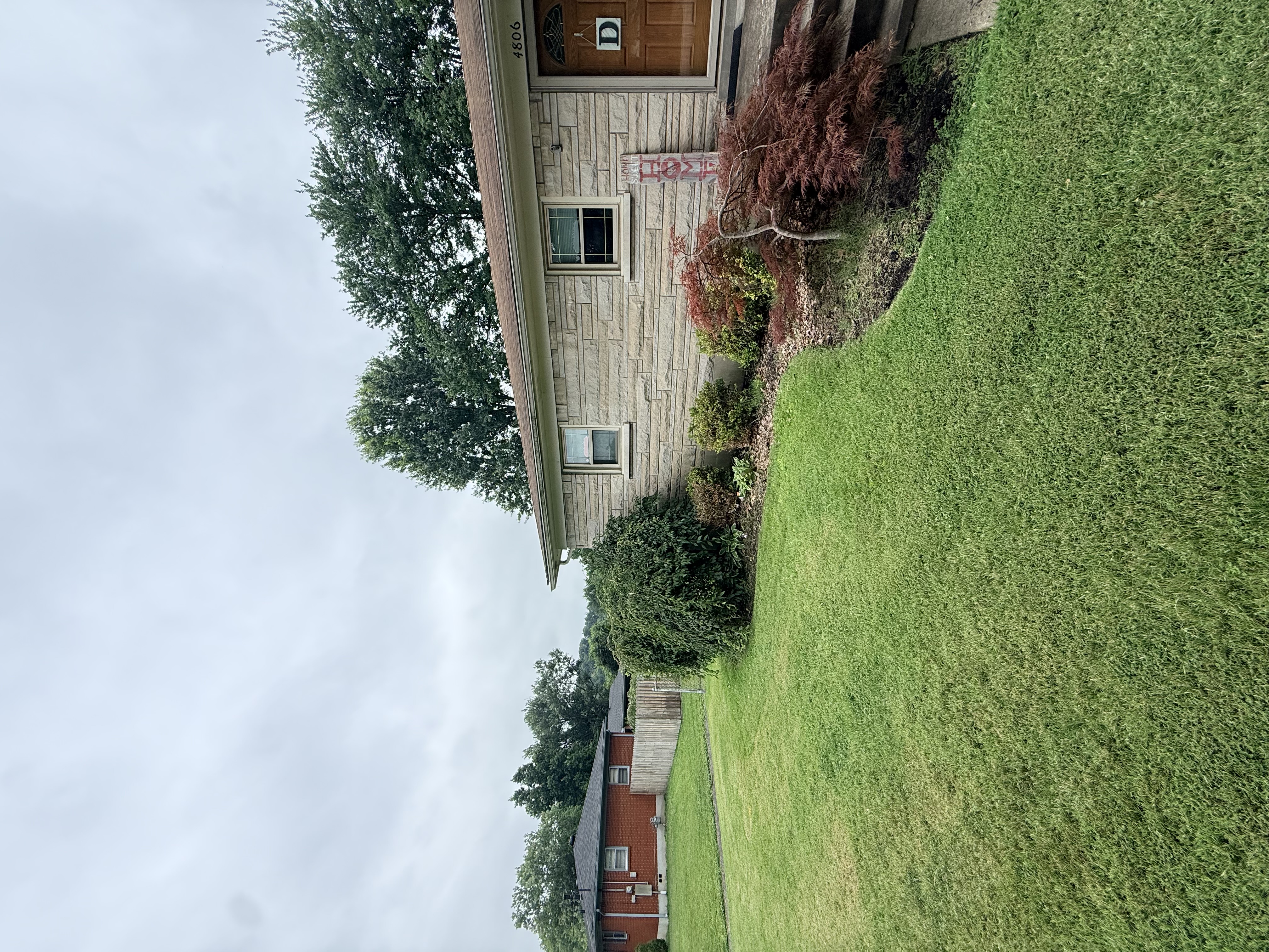 Entryway before landscaping bed installation