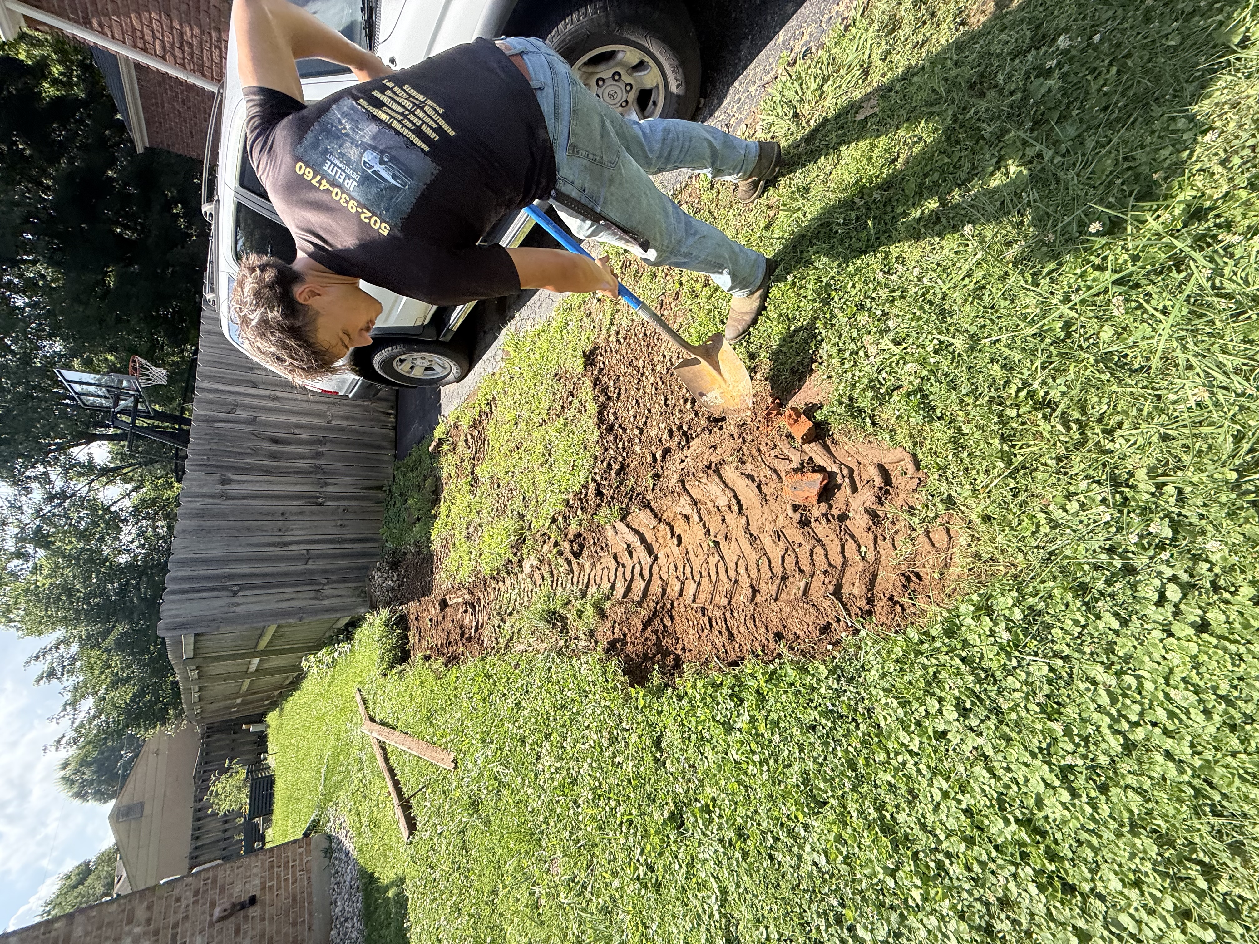 Crew planting a new shrub