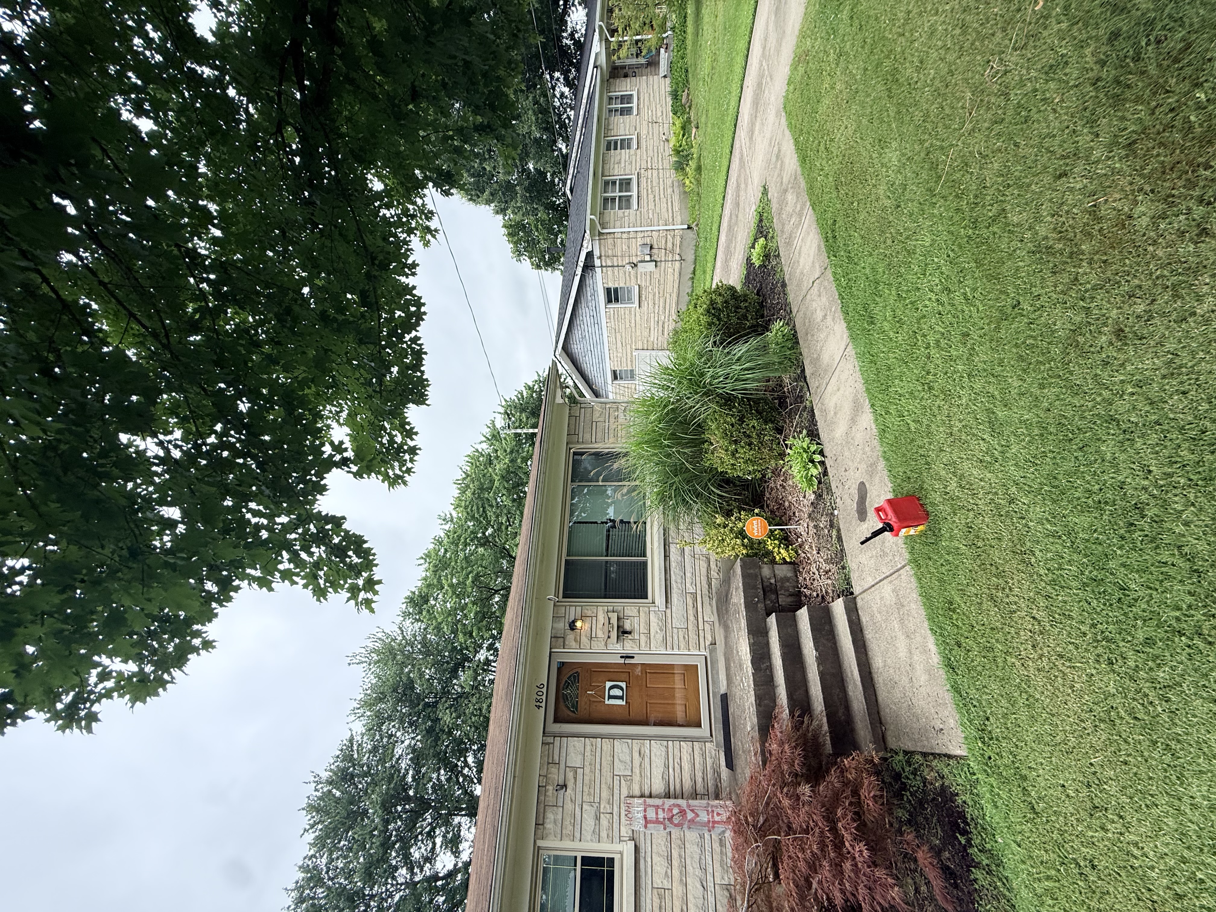 Fresh mulch bed with shrubs installed