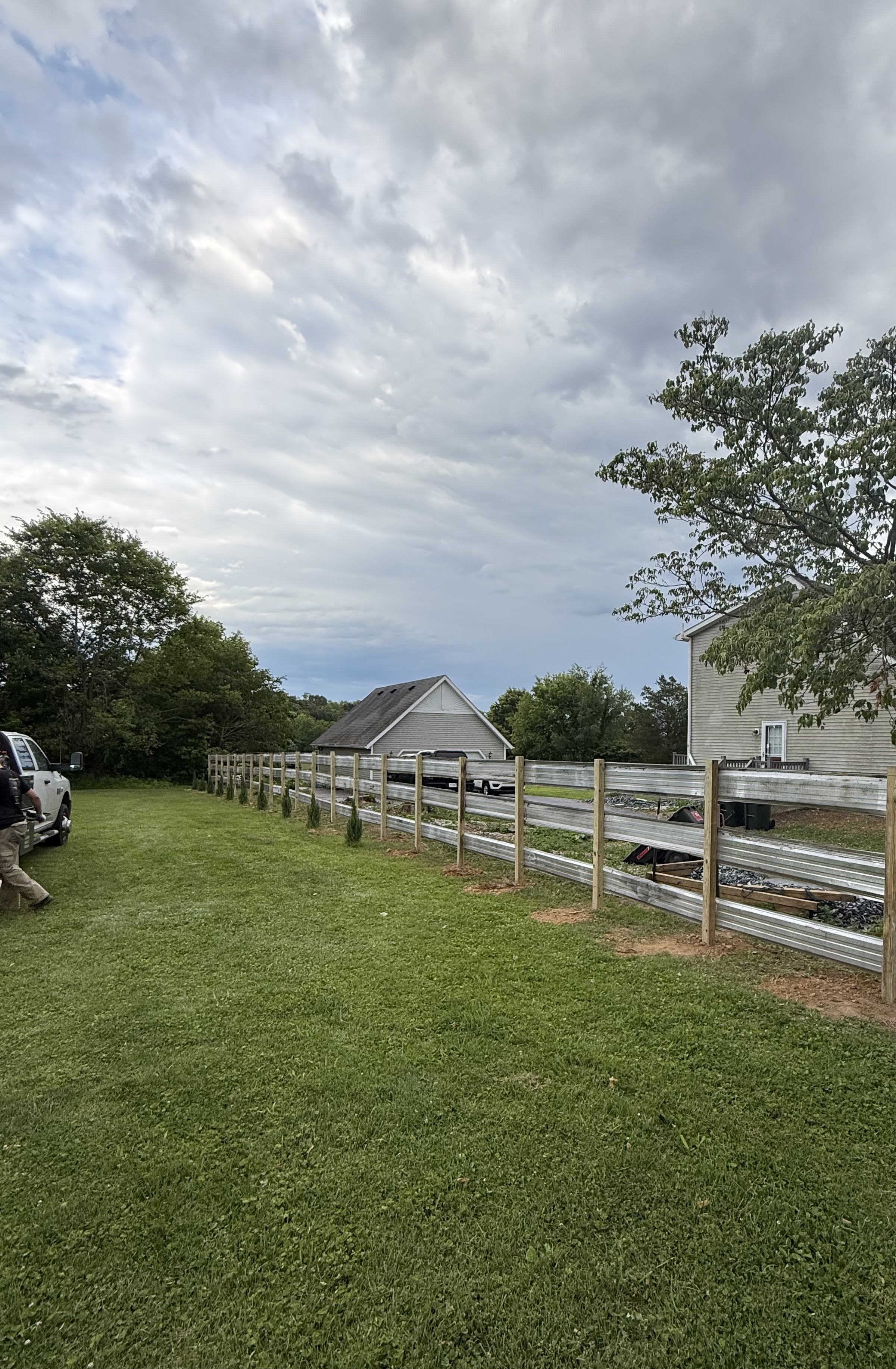 Aluminum guardrail-style fence installation